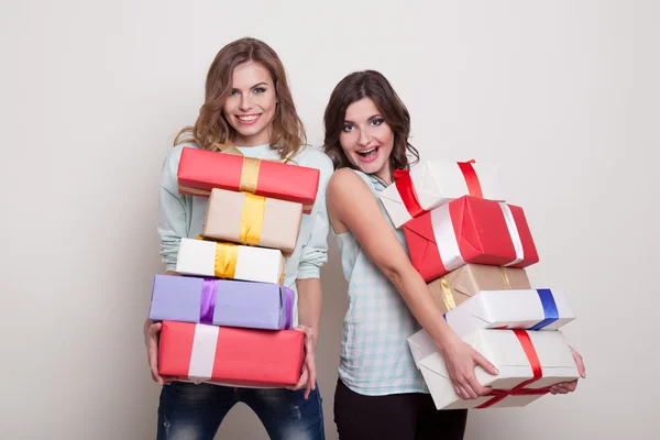 depositphotos_106315488-stock-photo-two-girlfriends-with-gifts.webp.webp.webp
